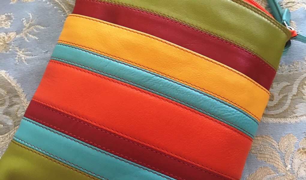 striped leather crossbody in chartreuse, red, orange, aqua, saffron, neversaydiebeauty.com