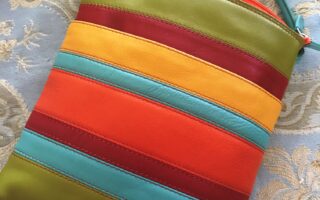 striped leather crossbody in chartreuse, red, orange, aqua, saffron, neversaydiebeauty.com