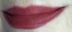 lip swatch of Red Delicious, a blue-red shade, from GrandeLips HydraPlump Liquid Lipstick, neversaydiebeauty.com