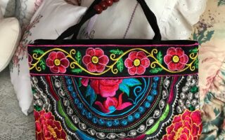 brightly colored embroidered purse, neversaydiebeauty.com