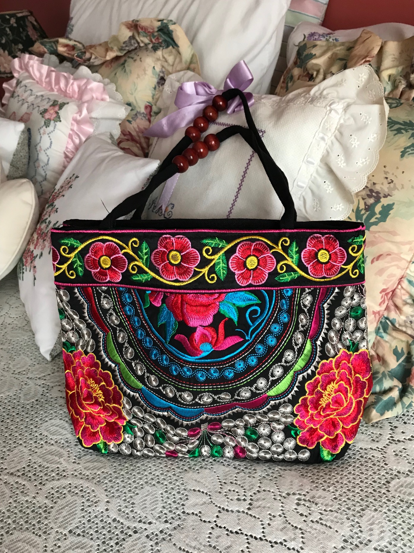 brightly colored embroidered purse, neversaydiebeauty.com