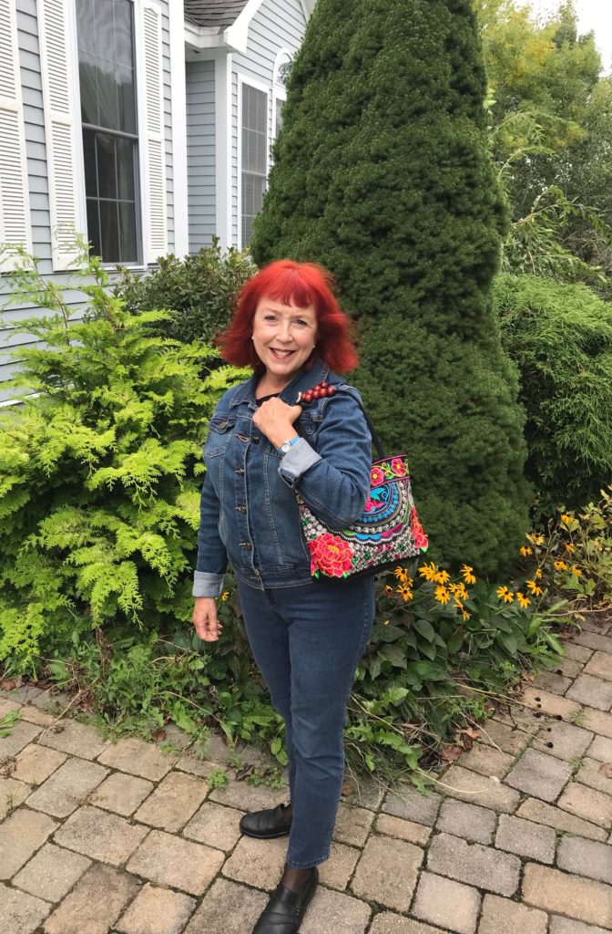 me wearing my new embroidered purse as a shoulder bag, neversaydiebeauty.com