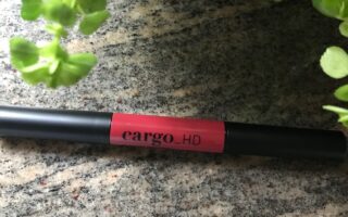 closeup of Cargo HD Lip Contour dual ended lipstick and highlighter tube, neversaydiebeauty.com