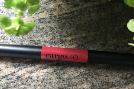 closeup of Cargo HD Lip Contour dual ended lipstick and highlighter tube, neversaydiebeauty.com