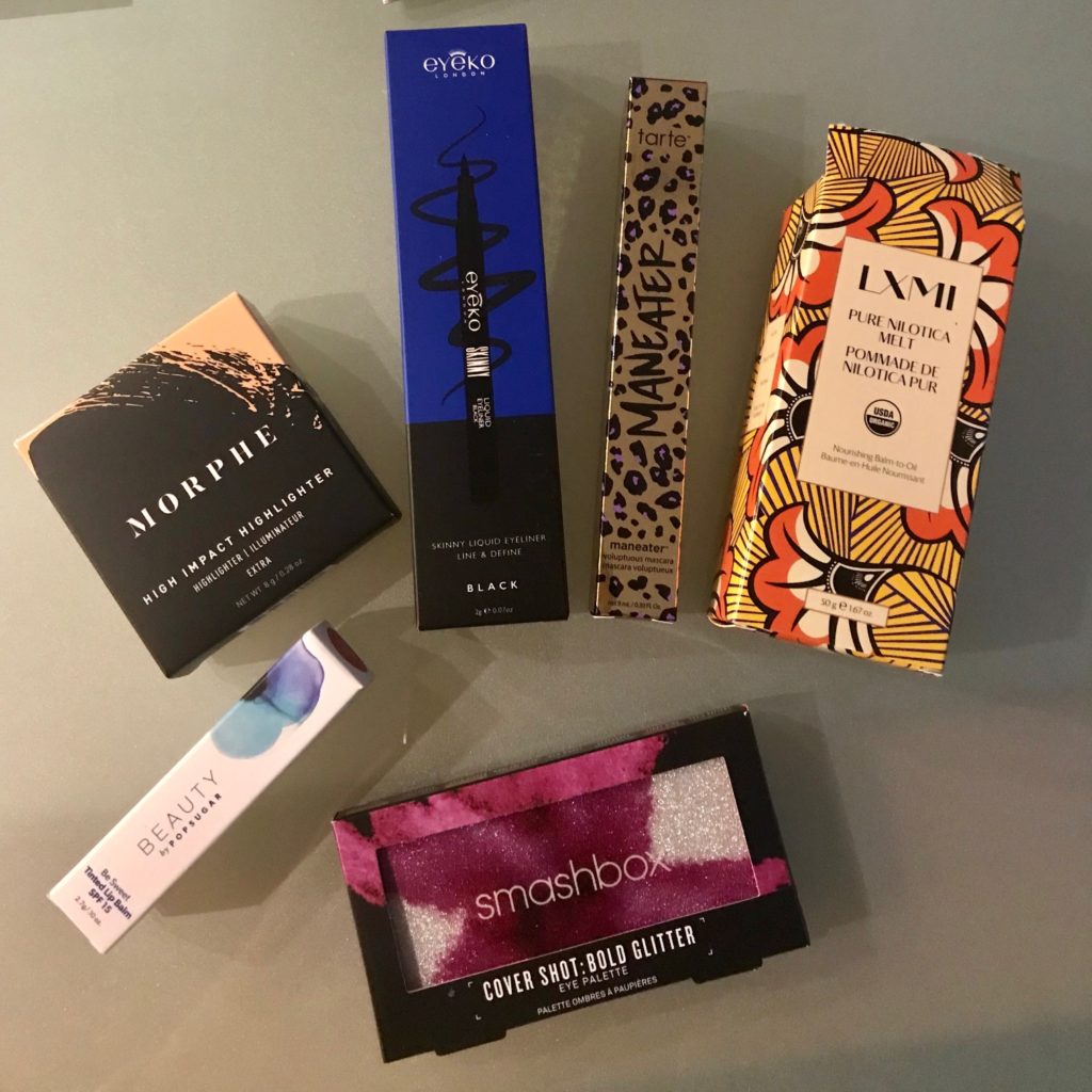 Ipsy Glam Bag Plus items in their outer packaging for October 2018, neversaydiebeauty.com