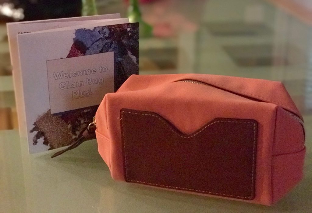 orange faux suede Ipsy Glam Bag Plus and product card for October 2018, neversaydiebeauty.com