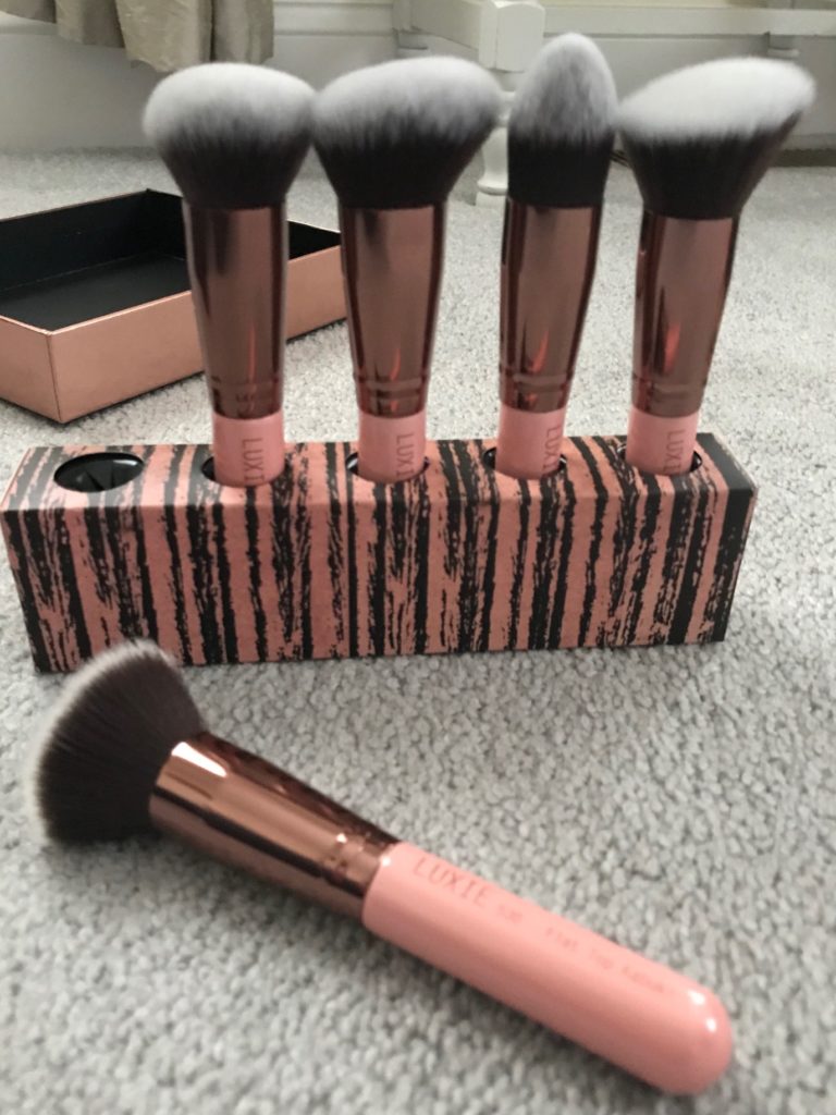 Luxie Rose Gold Kabuki Makeup Brush Set with a built-in brush caddy, neversaydiebeauty.com
