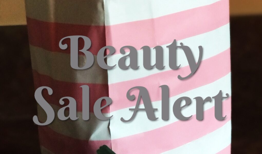 striped gift bag with Beauty Sale Alert