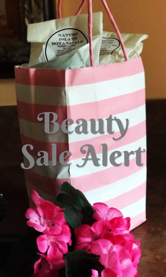 striped gift bag with Beauty Sale Alert