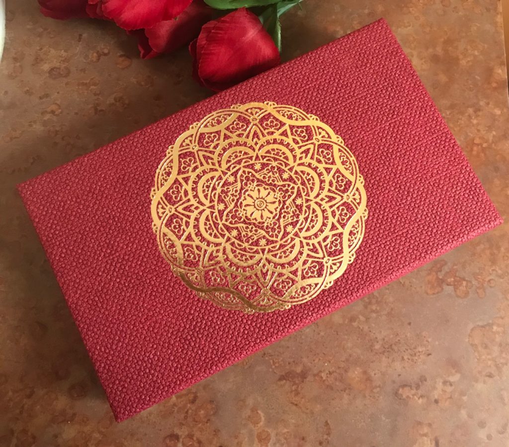 red and gold keepsake gift box from The Ritual of Ayurveda Balancing Treat Gift Set, neversaydiebeauty.com