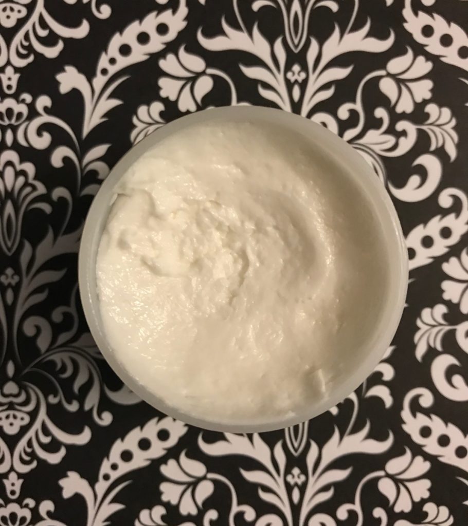 open jar of Cremeplexion Face Cream to show the white, mousse-like moisturizer inside, neversaydiebeauty.com