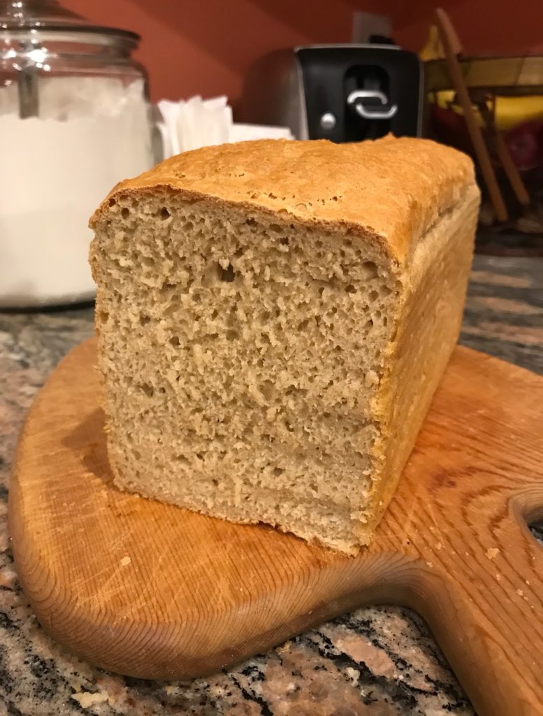 the inside of my home baked loaf of whole wheat bread to reveal the crumb, neversaydiebeauty.com