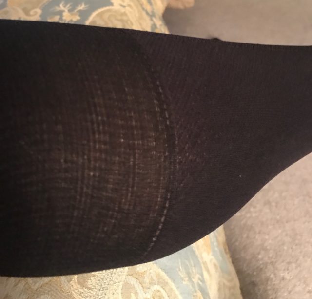 closeup of my leg wearing Berkshire Comfy Cuff Knee Hi sock to show the comfortable to wear elastic top, neversaydiebeauty.com