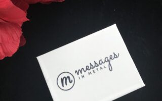 Messages In Metal outer box with brand name and logo, neversaydiebeauty.com