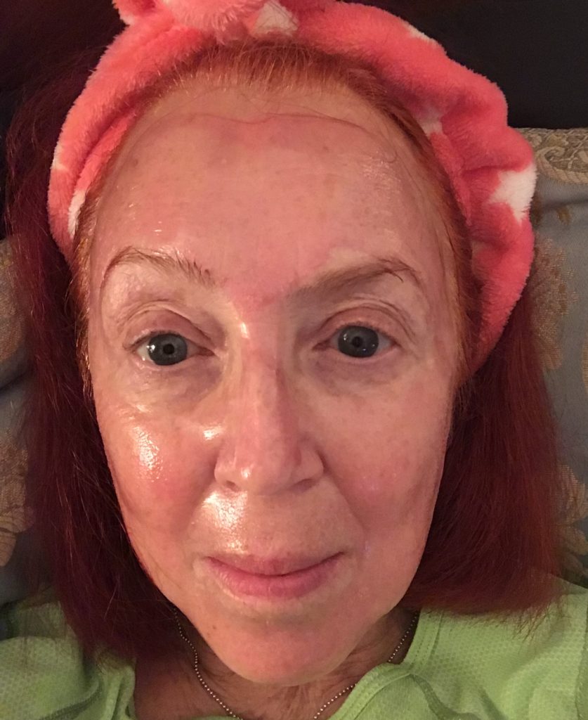 me wearing 7th Heave Pink Guava Peel-off Mask after it dried on my face, neversaydiebeauty.com