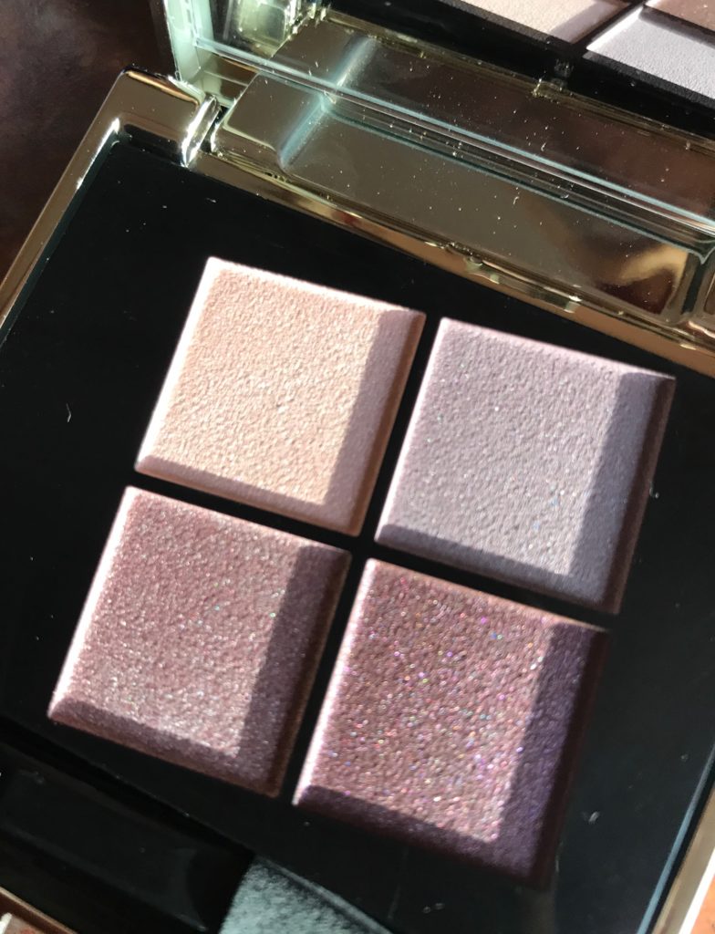 closeup of the 4 pans in shades of pink and purple from the Smith & Cult eyeshadow quad, neversaydiebeauty.com