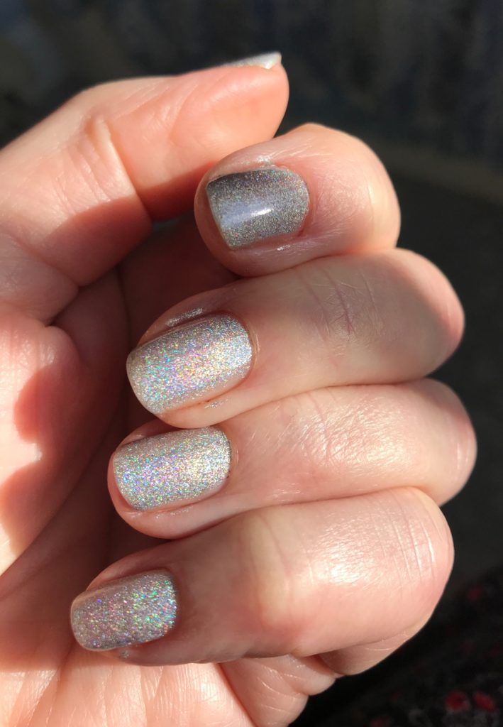 my nails wearing the silver holographic nail polish, Liquid Bling, from Morgan Taylor Platinum Professional Nail Lacquer, neversaydiebeauty.com