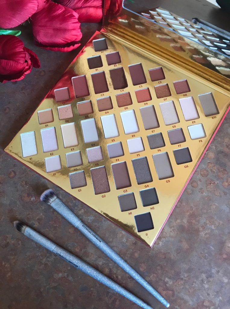 open Cargo Namastay LE Blockbuster Eyeshadow Palette to show the 44 shadow shades, neversaydiebeauty.com