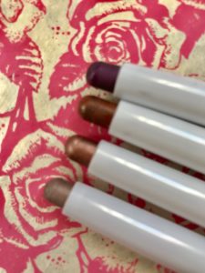 closeup of the tips of 4 of the Mally Evercolor Eye Shadow Sticks Extra, neversaydiebeauty.com