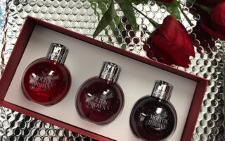 inside the Molton Brown Festive Bauble Set with 3 2.5 fl. oz. "ornaments" with shower gels: Pink Pepper, Frankincense & Allspice and Muddled Plum, neversaydiebeauty.com