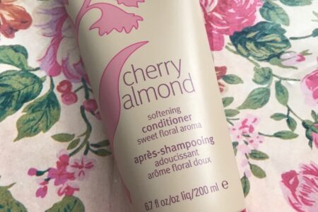 plastic tube of Aveda Cherry Almond Conditioner, neversaydiebeauty.com