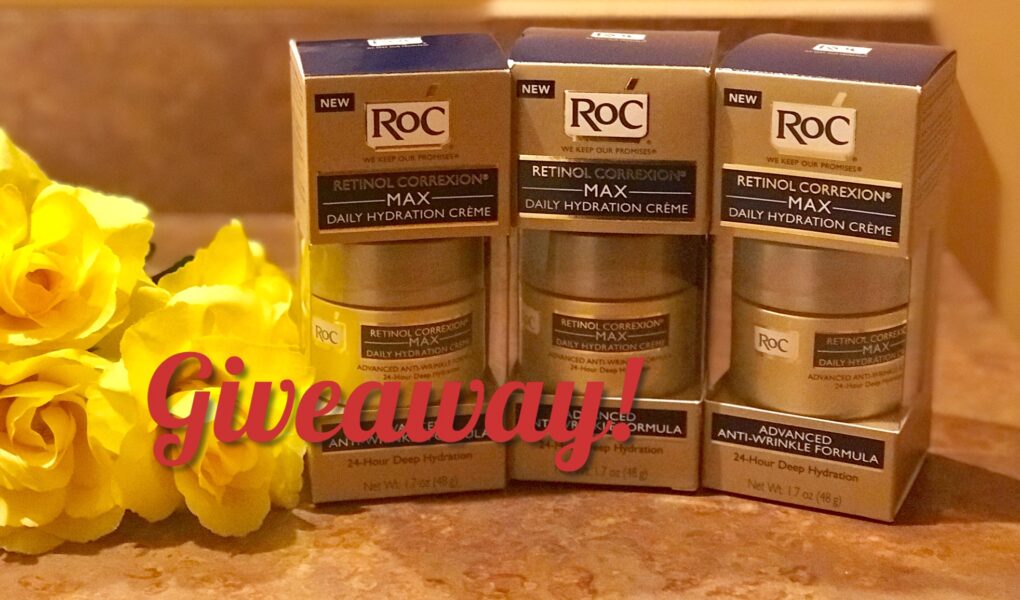 3 jars of RoC Retinol Correxion MAX Daily Hydration Creme in their outer packaging with Giveaway written on the photo, neversaydiebeauty.com