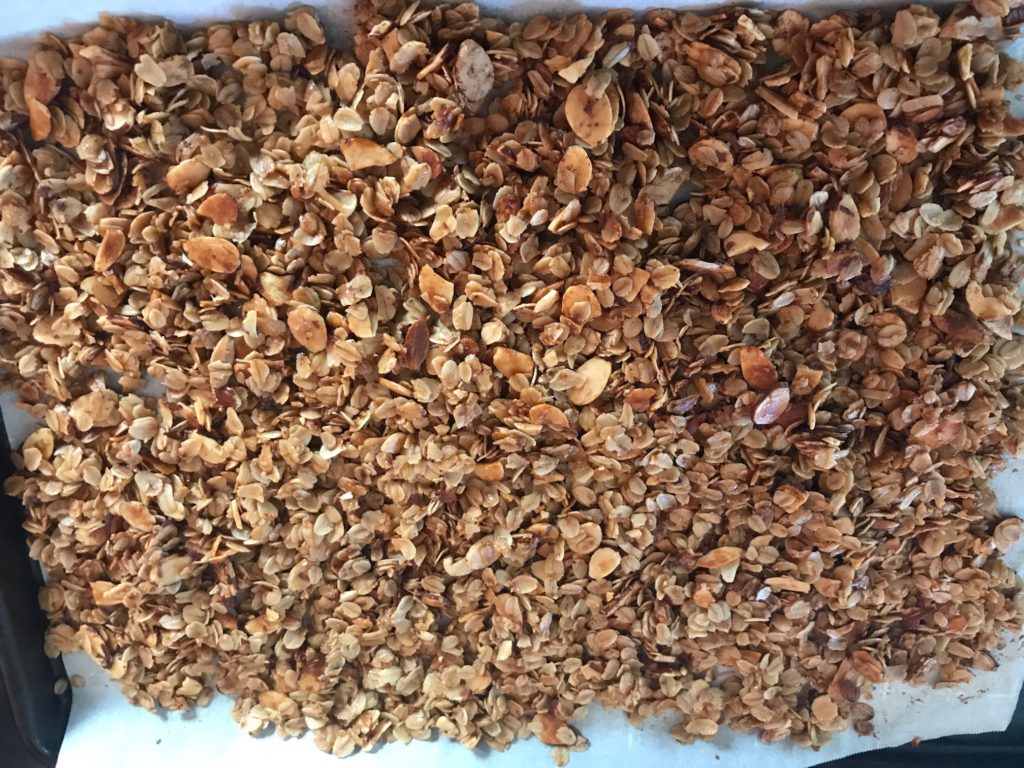 golden oats and almonds after baking with oil and honey, neversaydiebeauty.com