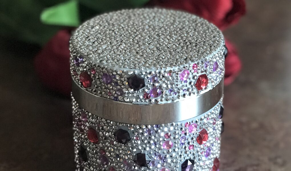 crystal encrusted jar of PRAI Throat & Decolletage Cream, neversaydiebeauty.com