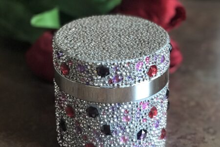 crystal encrusted jar of PRAI Throat & Decolletage Cream, neversaydiebeauty.com