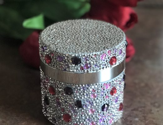 crystal encrusted jar of PRAI Throat & Decolletage Cream, neversaydiebeauty.com