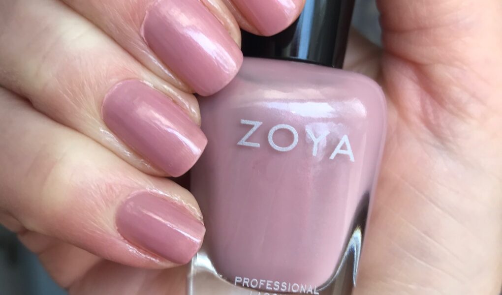 my nails wearing cool-toned light pink Zoya Caresse nail polish, neversaydiebeauty.com