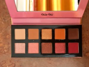 open Violet Voss mini HG eyeshadow palette showing the warm-toned reddish shades, neversaydiebeauty.com