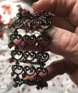 1960s black wire heart bracelet with red/purple crystals, neversaydiebeauty.com