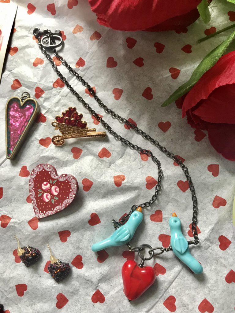 some pieces of heart jewelry, neversaydiebeauty.com