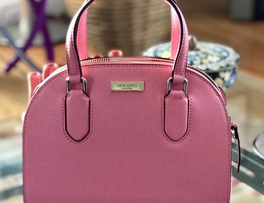 Kate Spade Reiley done satchel bag in Carolina Coral, a peachy-pink
