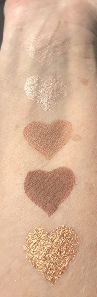swatches of shades 1-5 in the Sultry Nights eyeshadow palette from Physicians Formula in bright sunlight, neversaydiebeauty.com