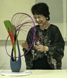 Tomoko Tanaka with her abstract Ikebana arrangement, neversaydiebeauty.com