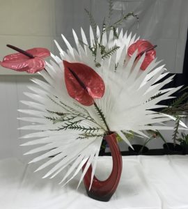 Ikebana arrangement with anthurium and bleached palmetto leaves, neversaydiebeauty.com