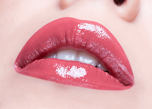 lip swatch of City Lips Plumping Lip Gloss, a deep pink-mauve called Crimson