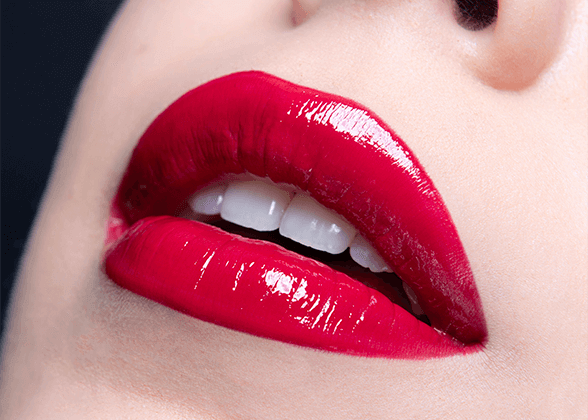 lip swatch of Red Velvet, a deep red shade of City Lips Lip Plumping gloss