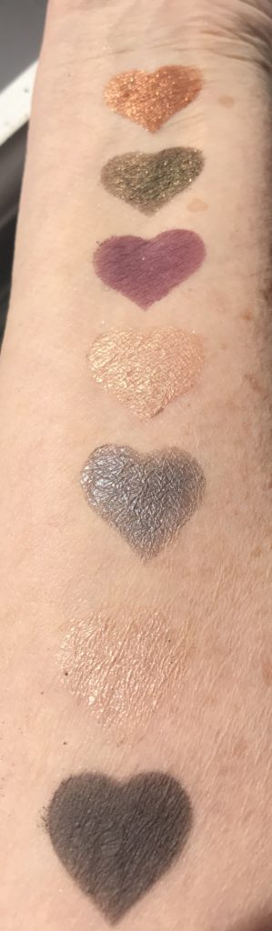 swatches of pans 6-12 in sunlight from Physicians Formula Sultry Nights palette, neversaydiebeauty.com