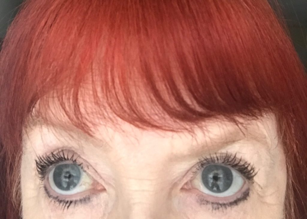 eyelashes wearing Maybelline Lash Sensational Mascara and after using RapidLash for a month, neversaydiebeauty.com