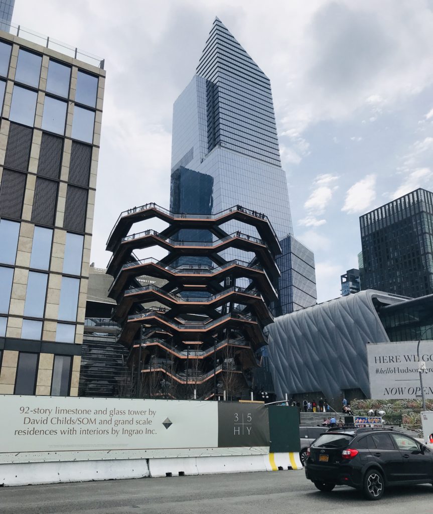 Hudson Yards in NYC with the Vessel in the center of the photo, neversaydiebeauty.com