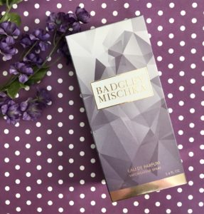purple box that houses the bottle of Badgley Mischka Eau de Parfum, neversaydiebeauty.com