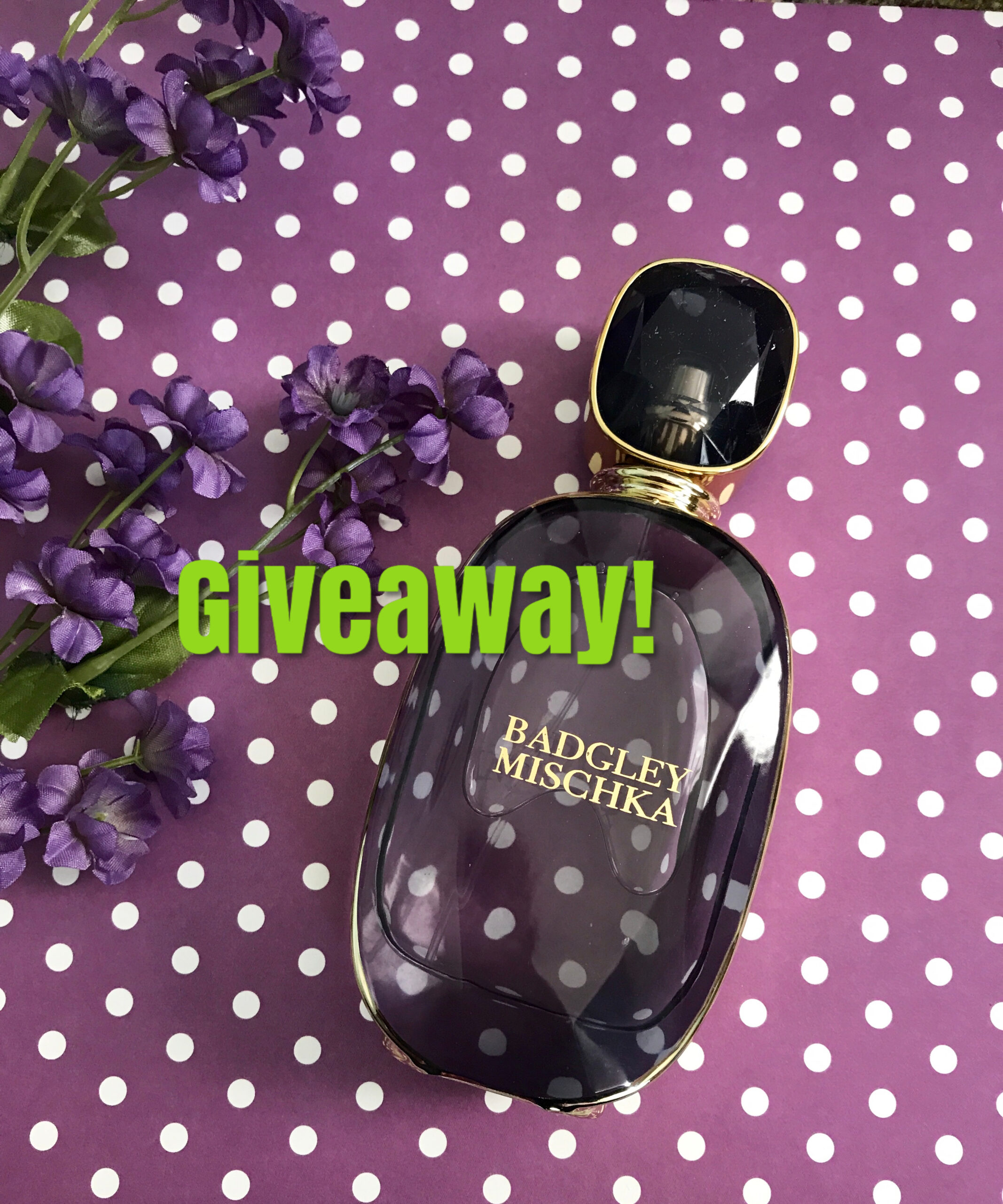 purple glass faceted bottle of Badgley Mischka Eau de Parfum with giveaway written on the photo, neversaydiebeauty.com