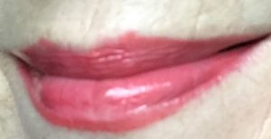 lip swatch of BECCA Glow Gloss in rosy pink Snapdragon worn with Illamasqua Lipliner in pink shade, Media