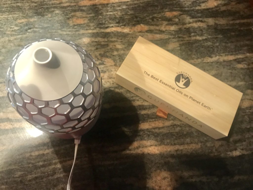 top down view of Gurunanda Honeycomb Ultrasonic Diffuser and set of Top 6 Essential Oil Blends