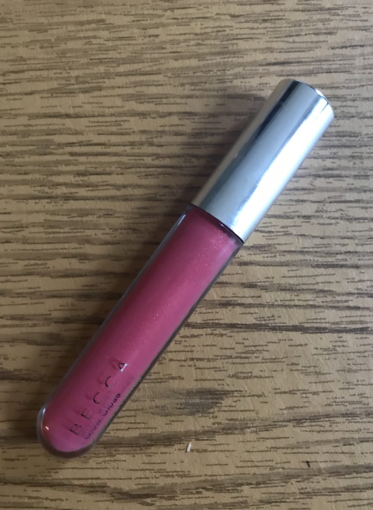 tube of rosy pink BECCA Glow Gloss in shade, Snapdragon