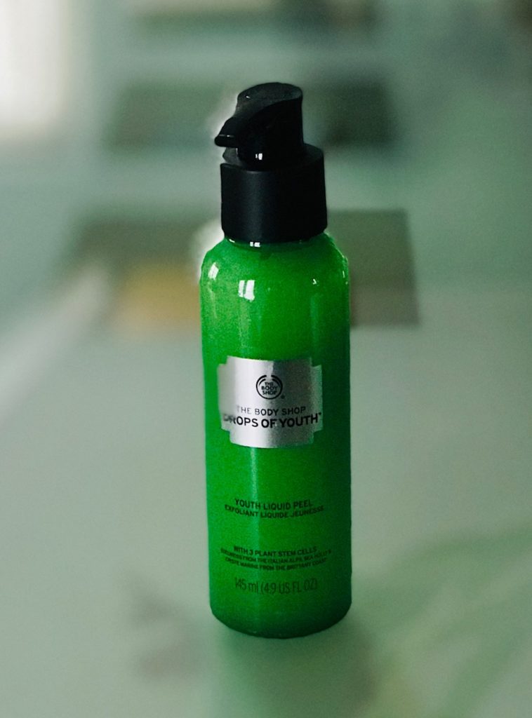 green pump bottle of The Body Shop Drops of Youth Liquid Peel, neversaydiebeauty.com
