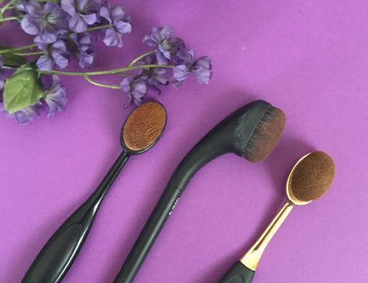 curved neck of the Artis Brushcraft Oval 6 makeup brush compared to two knockoffs that are more similar to the Artis Elite Oval 6, neversaydiebeauty.com